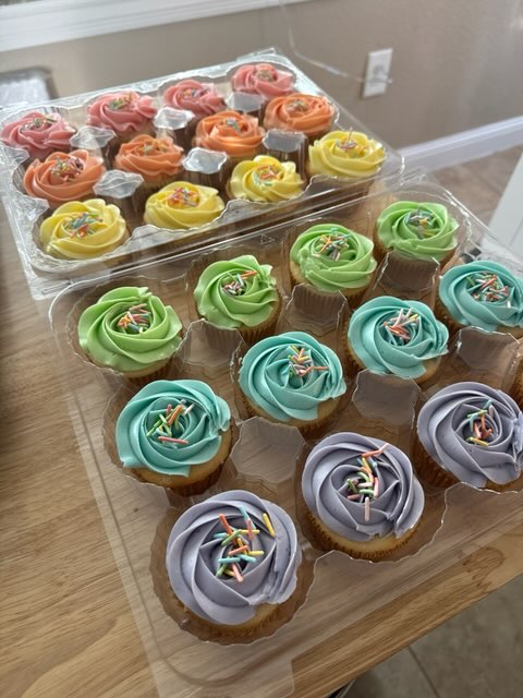 Pastel rosette cupcakes with rainbow sprinkles
