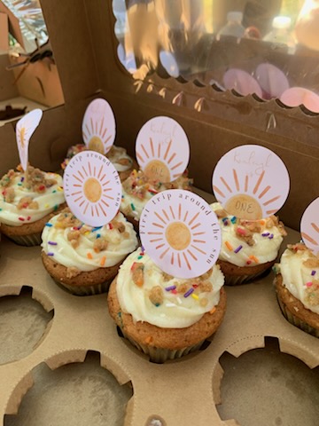 Funfetti cupcakes with 'first trip around the sun' toppers
